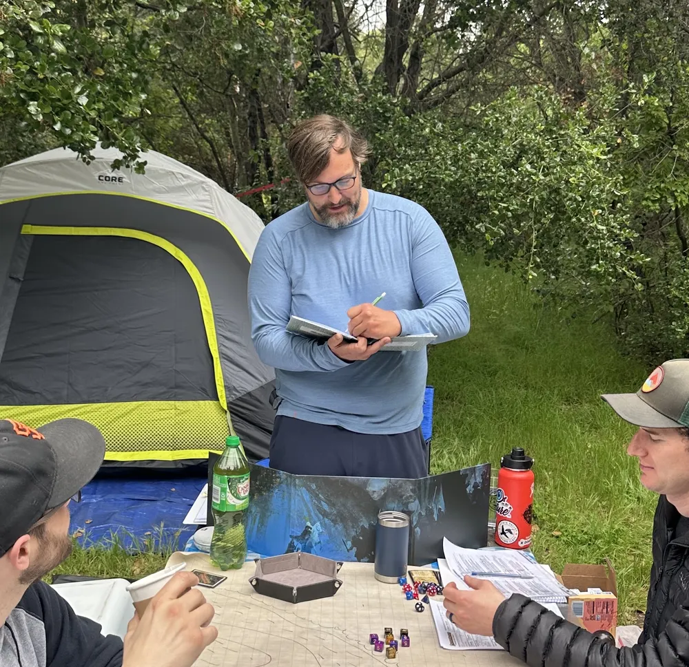Tom running a TTRPG session outdoors